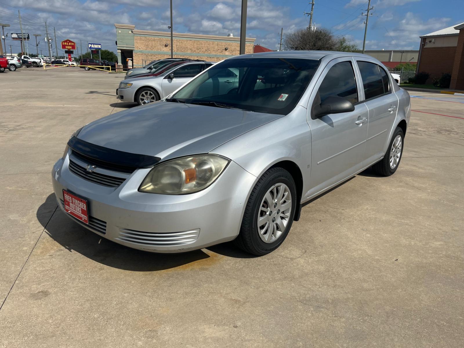 2009 SILVER /black Chevrolet Cobalt LS Sedan (1G1AS58H697) with an 2.2L L4 DOHC 16V engine, 4-Speed Automatic Overdrive transmission, located at 14700 Tomball Parkway 249, Houston, TX, 77086, (281) 444-2200, 29.928619, -95.504074 - Photo #2